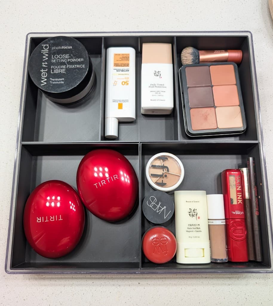 Custom getGridded makeup organizer with compartments for powders, sunscreen, and cosmetics